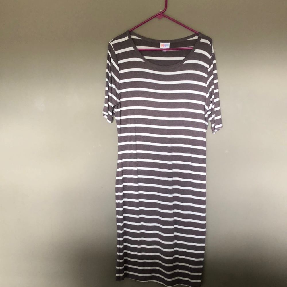 Form fitting, stretchy material dress.